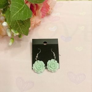Cute Green floral plastic earrings.